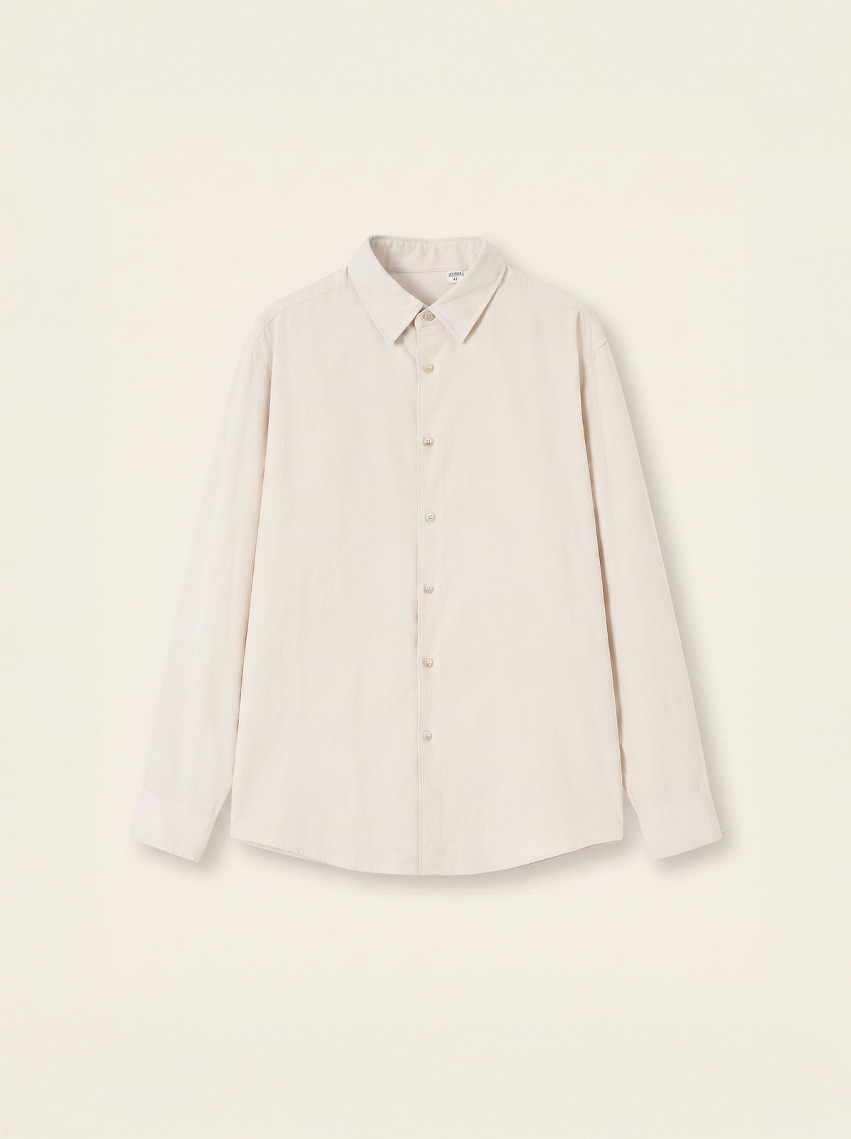 #Ecru-Ivory_group   A light beige long-sleeve button-up shirt with a classic collar, laid flat against a matching light beige background.