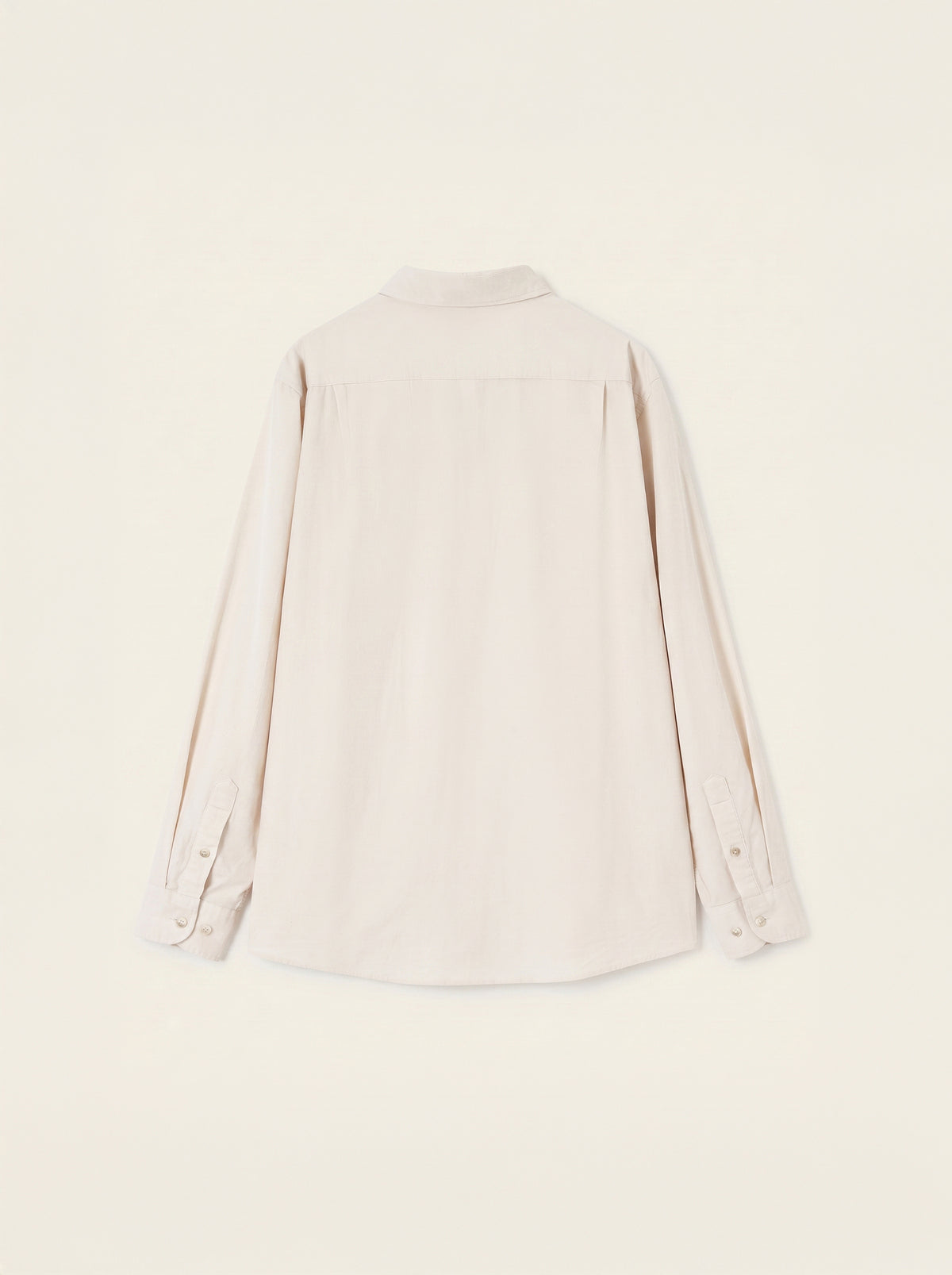 #Ecru-Ivory_group A light beige long-sleeve button-up shirt shown from the back, laid flat against a matching light beige background.