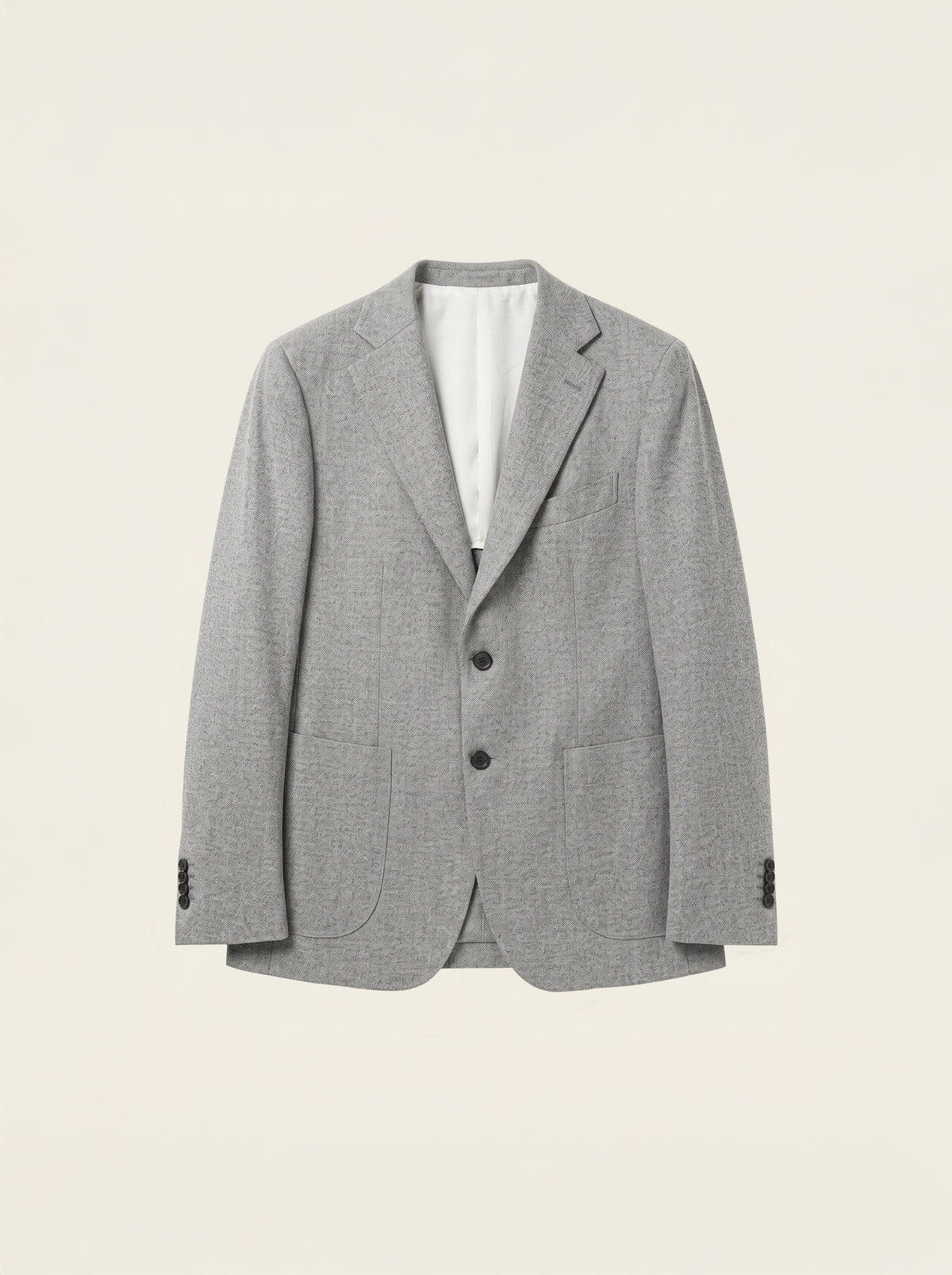 #Charcoal-Grey_group A light gray textured blazer with a two-button front closure, displayed on a neutral cream background.