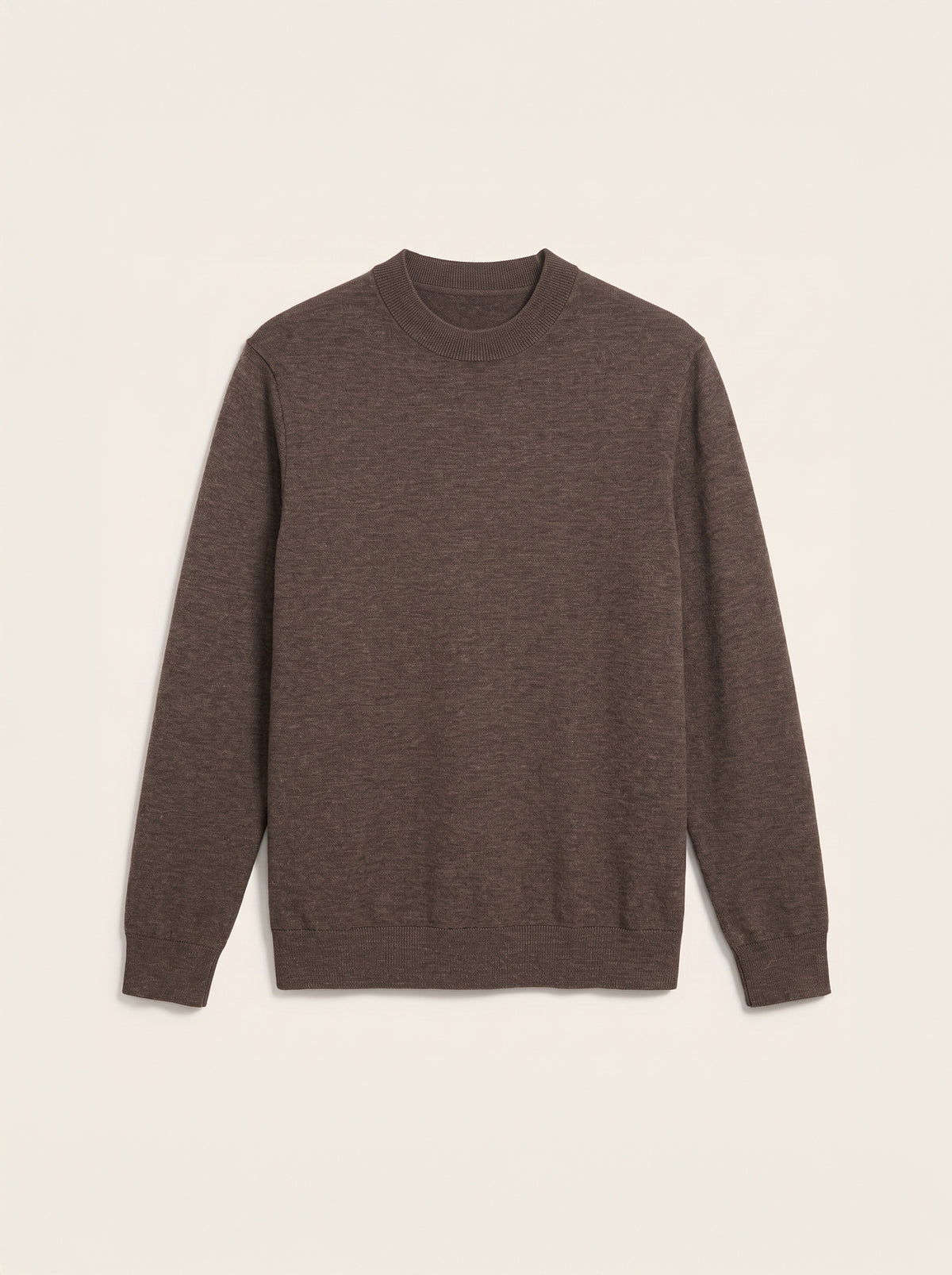 #Cedar-Brown_group A dark brown long-sleeve crewneck sweater laid flat against a light cream background.