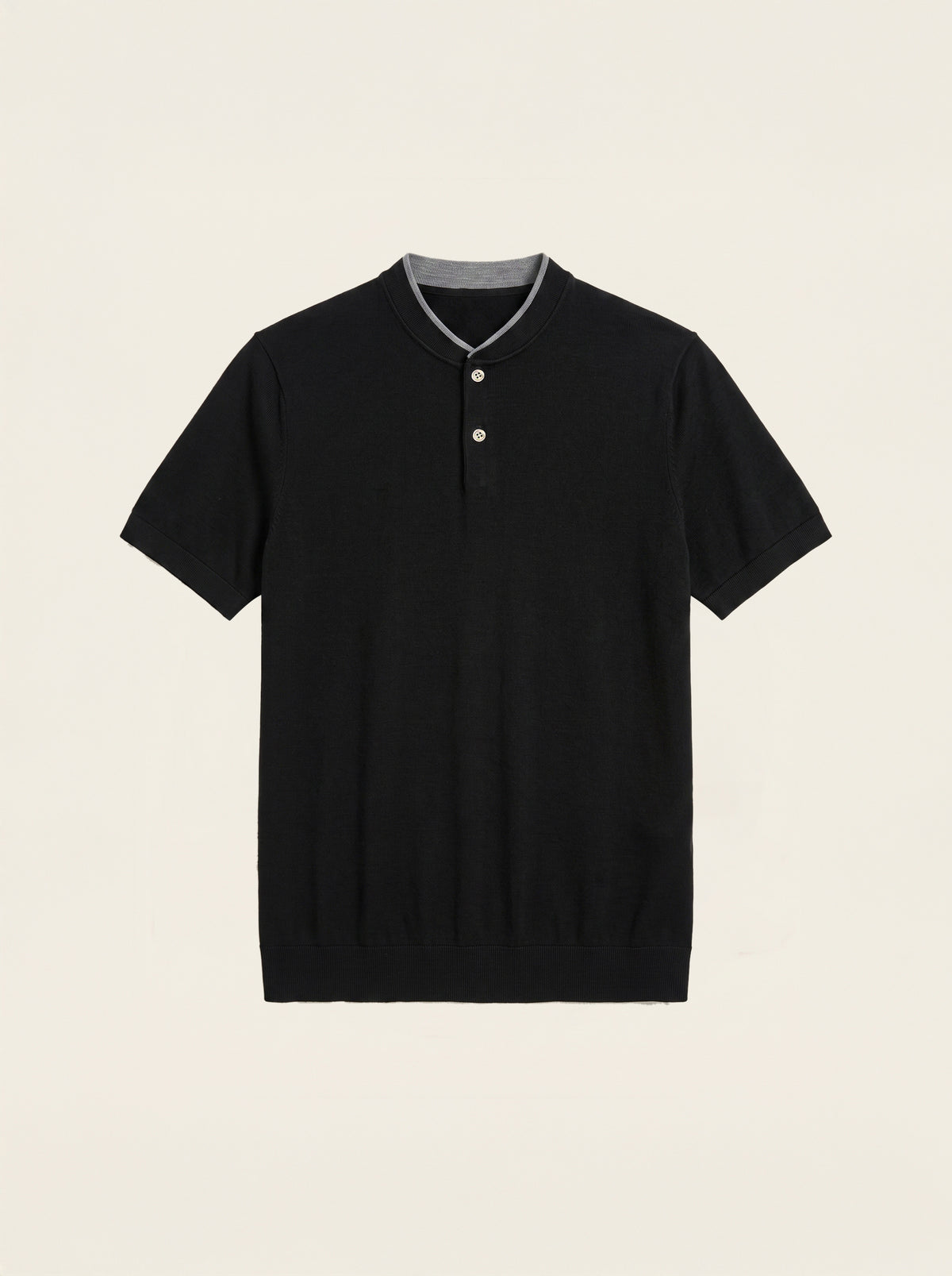 #Jet-Black_group  A black short-sleeve knit polo shirt with a gray contrast collar and a three-button placket, displayed flat against a light beige background.