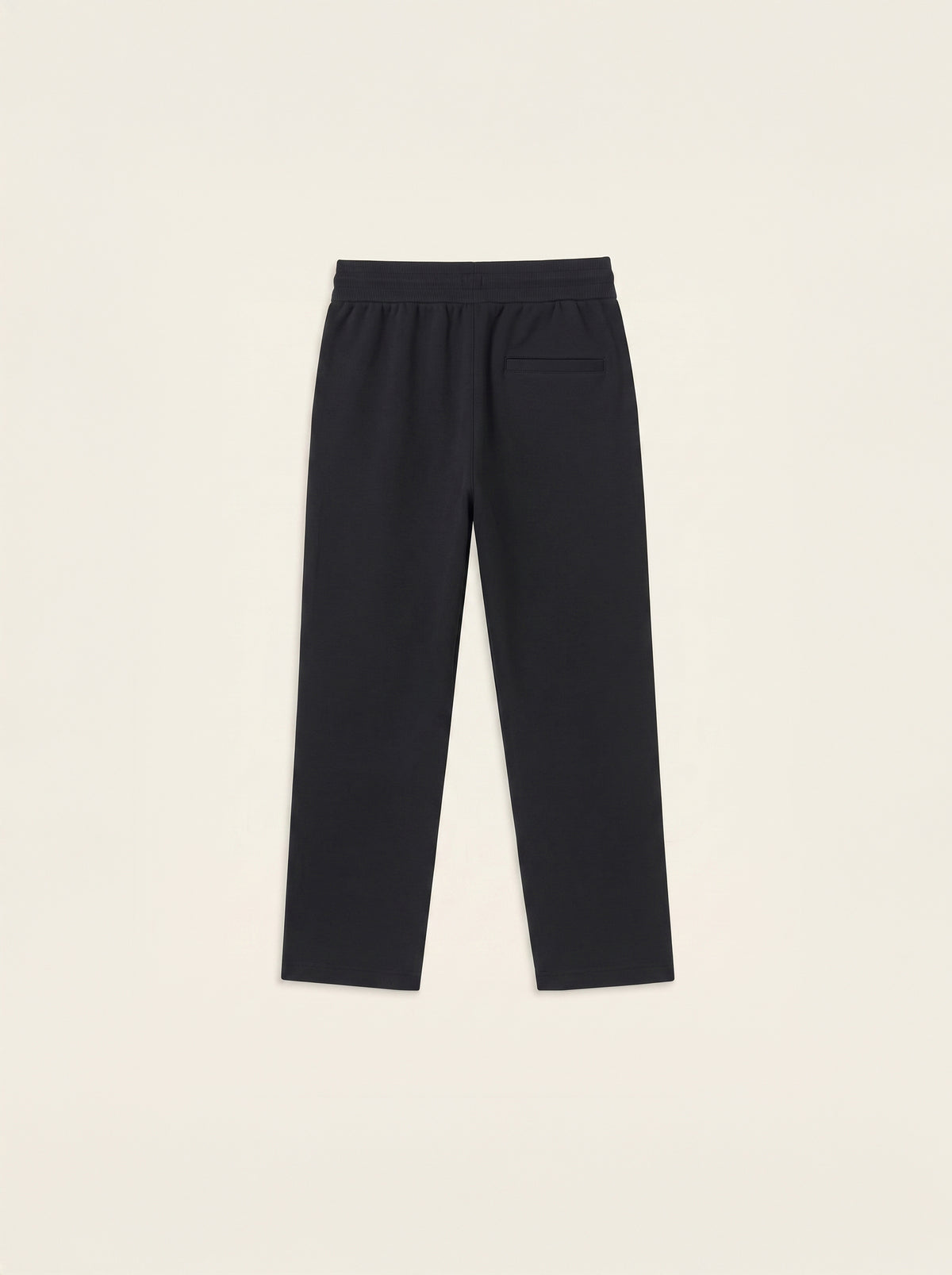 #Jet-Black_group A pair of dark charcoal gray cropped pants with a wide elastic waistband and a side welt pocket, shown flat against a light cream background.